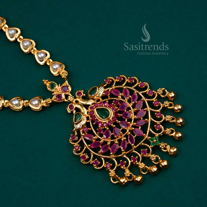 Dual-tone ruby-green peacock pendant necklace with American diamonds and pearl drops – a micro gold plated ethnic jewellery masterpiece for vibrant saree styling – Sasitrends