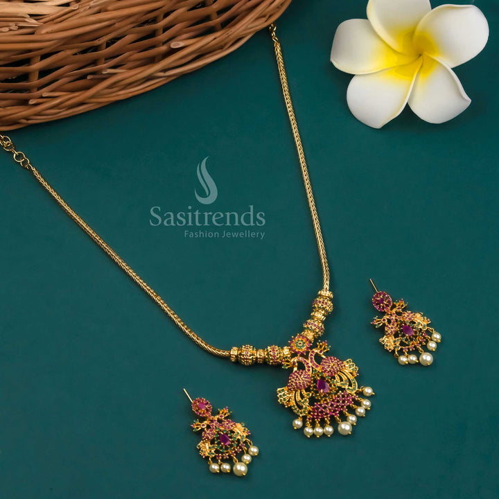 Elegant Micro Gold Plated Peacock Pendant Necklace Set with Earrings embellished with American Diamond Stones in Ruby-Green - Sasitrends