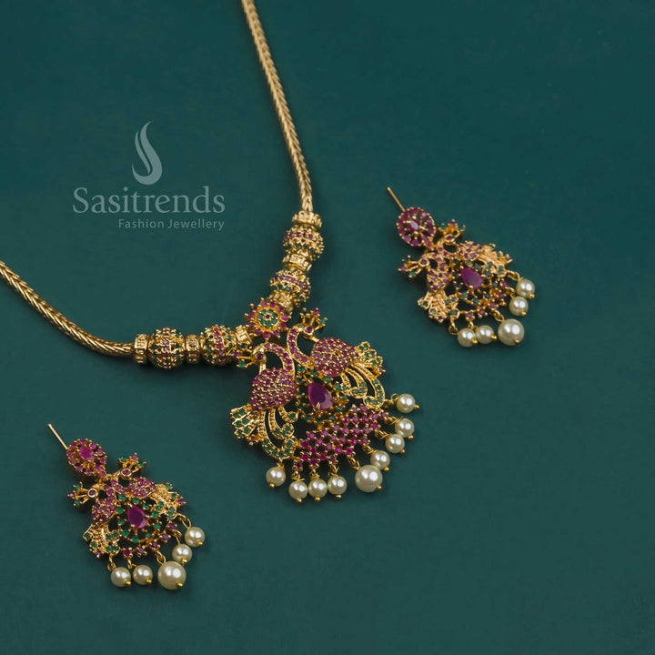 Gorgeous Micro Gold Plated Peacock Pendant Necklace Set with Earrings featuring American Diamond Stones in Ruby-Green shades - Sasitrends