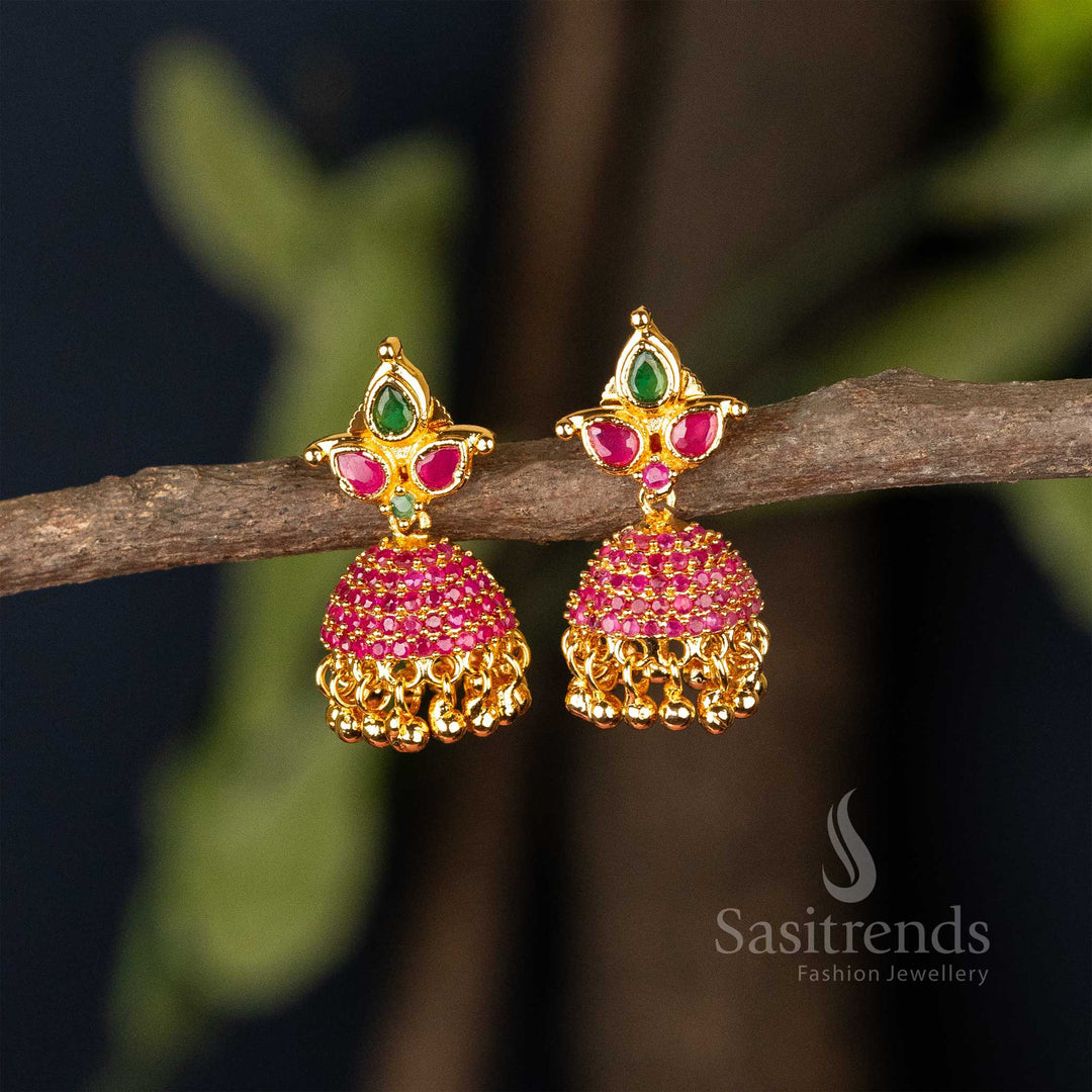 Traditional ruby-green temple Jhumka earrings finished in micro gold plating, adorned with American Diamond highlights and fine filigree – Ethnic grandeur for special occasions – Sasitrends