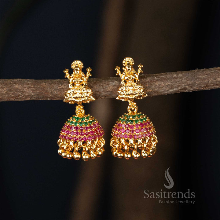 Majestic ruby-green colour micro gold plated flower designer jhumkas earrings enhanced with divine god motif, a perfect choice for traditional wedding wear - Sasitrends