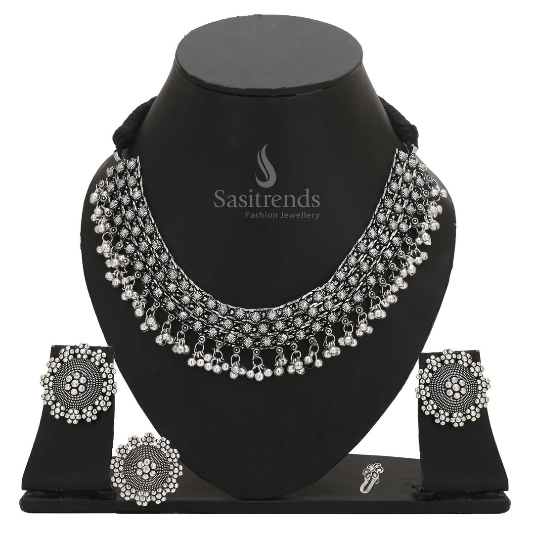 Eternal Elegance oxidised silver finish temple-inspired choker paired with teardrop earrings, stone-accented nosepin and classic ring – Sasitrends