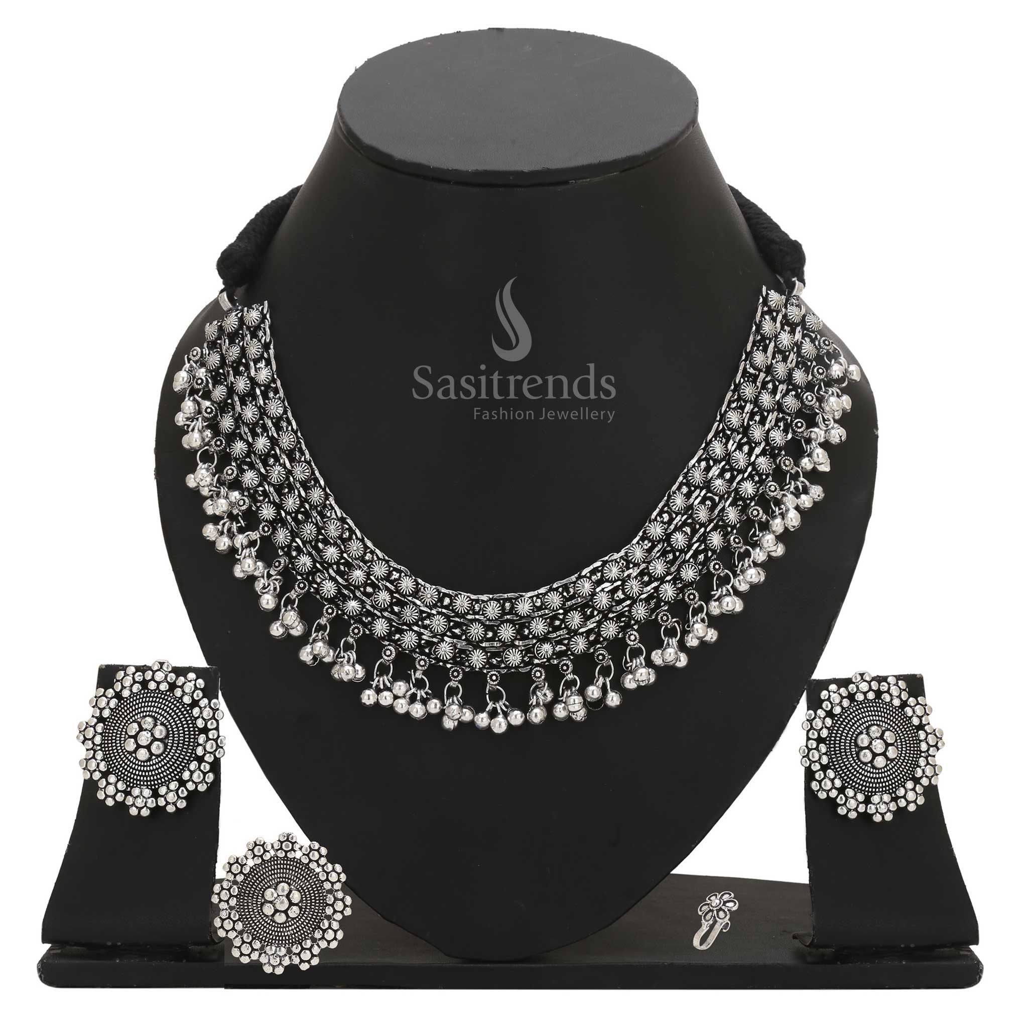 Eternal Elegance oxidised silver finish temple-inspired choker paired with teardrop earrings, stone-accented nosepin and classic ring – Sasitrends