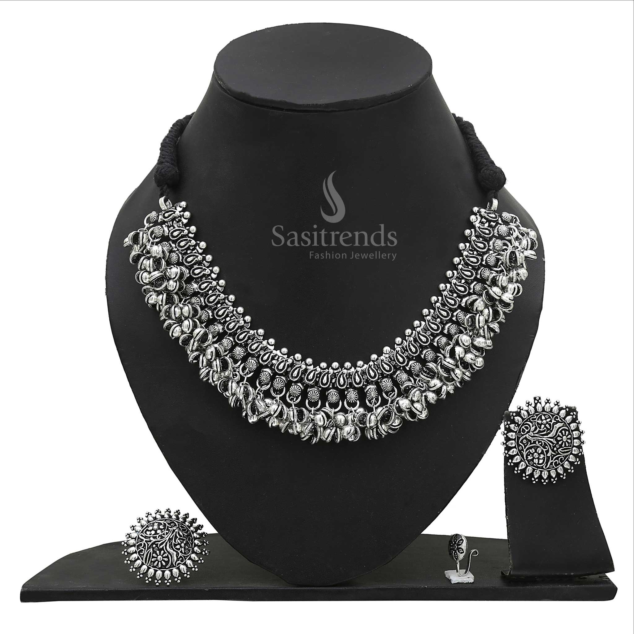 Moonlit Grace oxidised silver choker set featuring engraved floral patterns with coordinated earrings, artistic ring, and minimalist nosepin – Sasitrends