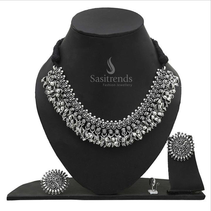 Moonlit Grace oxidised silver choker set featuring engraved floral patterns with coordinated earrings, artistic ring, and minimalist nosepin – Sasitrends
