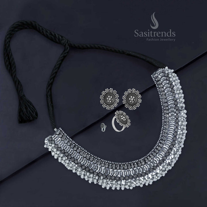 Mystic Maaya oxidised silver antique combo featuring a rounded choker, peacock design earrings, heritage nosepin, and vintage-style ring – Sasitrends