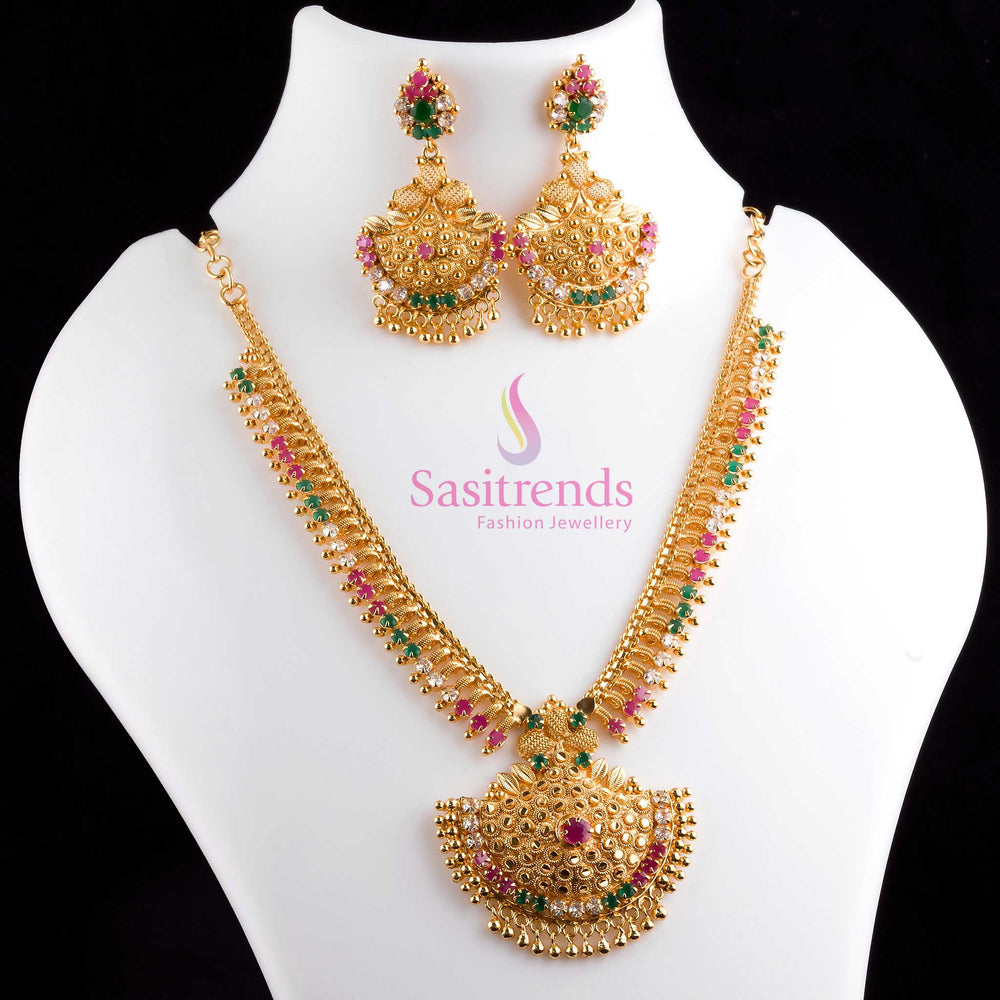 Grand multicolour Tilak design necklace and earrings jewellery set in micro gold plating with sparkling AD stones, perfect for lavish festival looks and traditional celebrations – Sasitrends