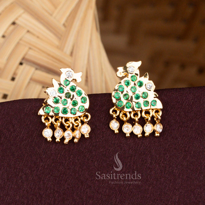 Temple-style brass Impon earrings Green AD stones, pearl dewdrop hangings, and rich micro gold plating – A divine blend of heritage and elegance in ethnic jewellery – Sasitrends