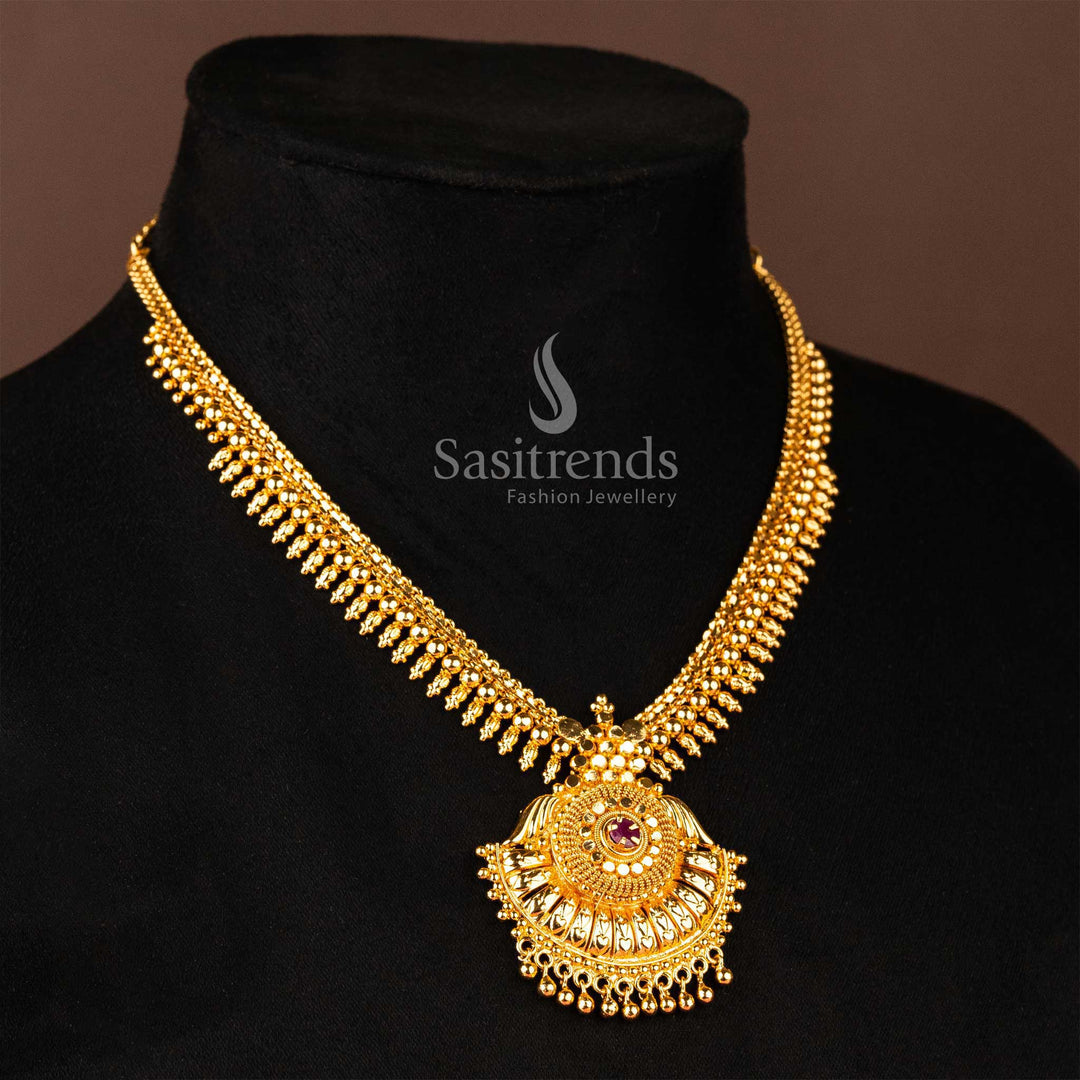 Elegant ruby floral pendant paired with a gold-plated necklace featuring American diamond accents - Sasitrends