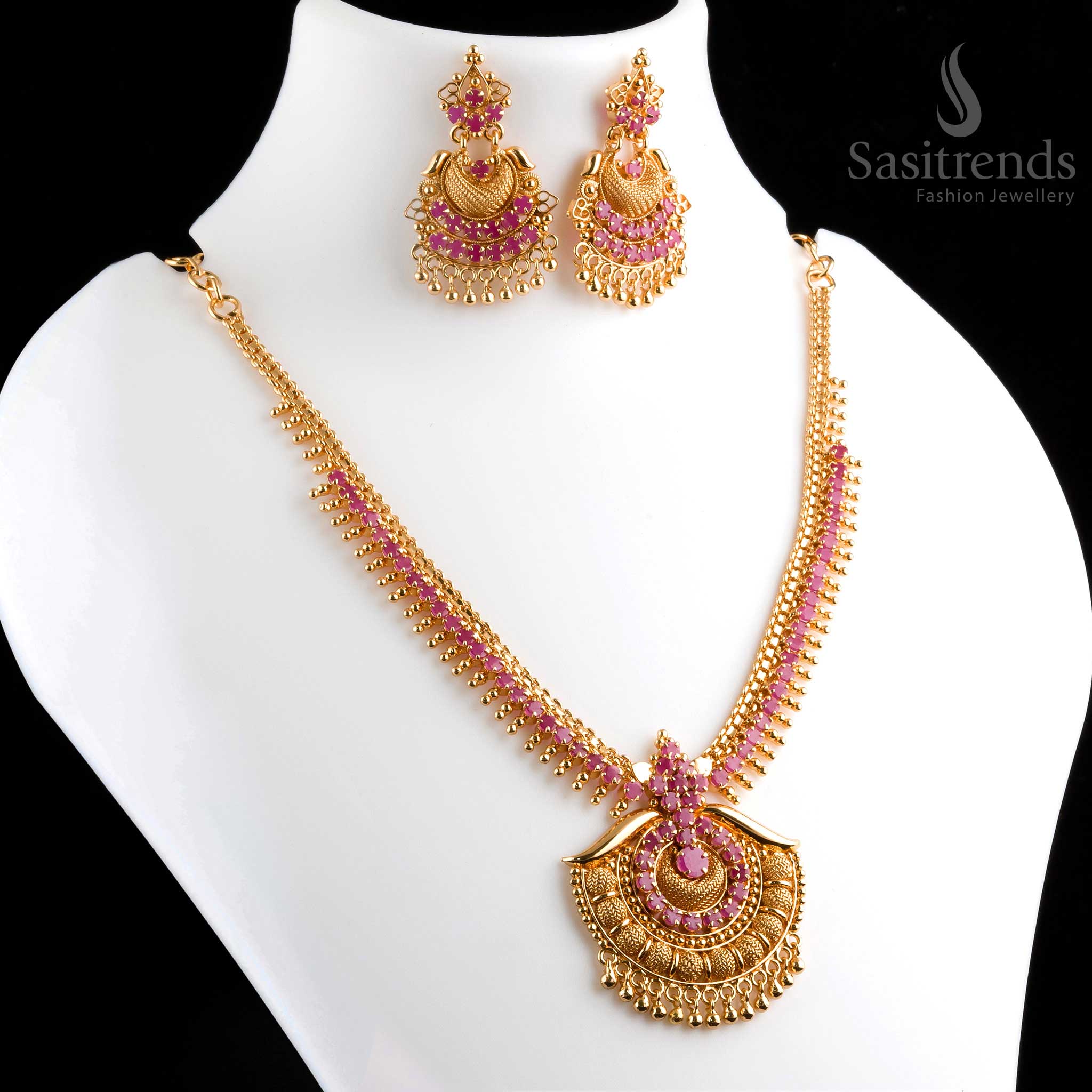 Stunning regal micro gold plated ruby AD tilak pendant necklace with earrings, featuring intricate patterns and dazzling AD stones - Sasitrends