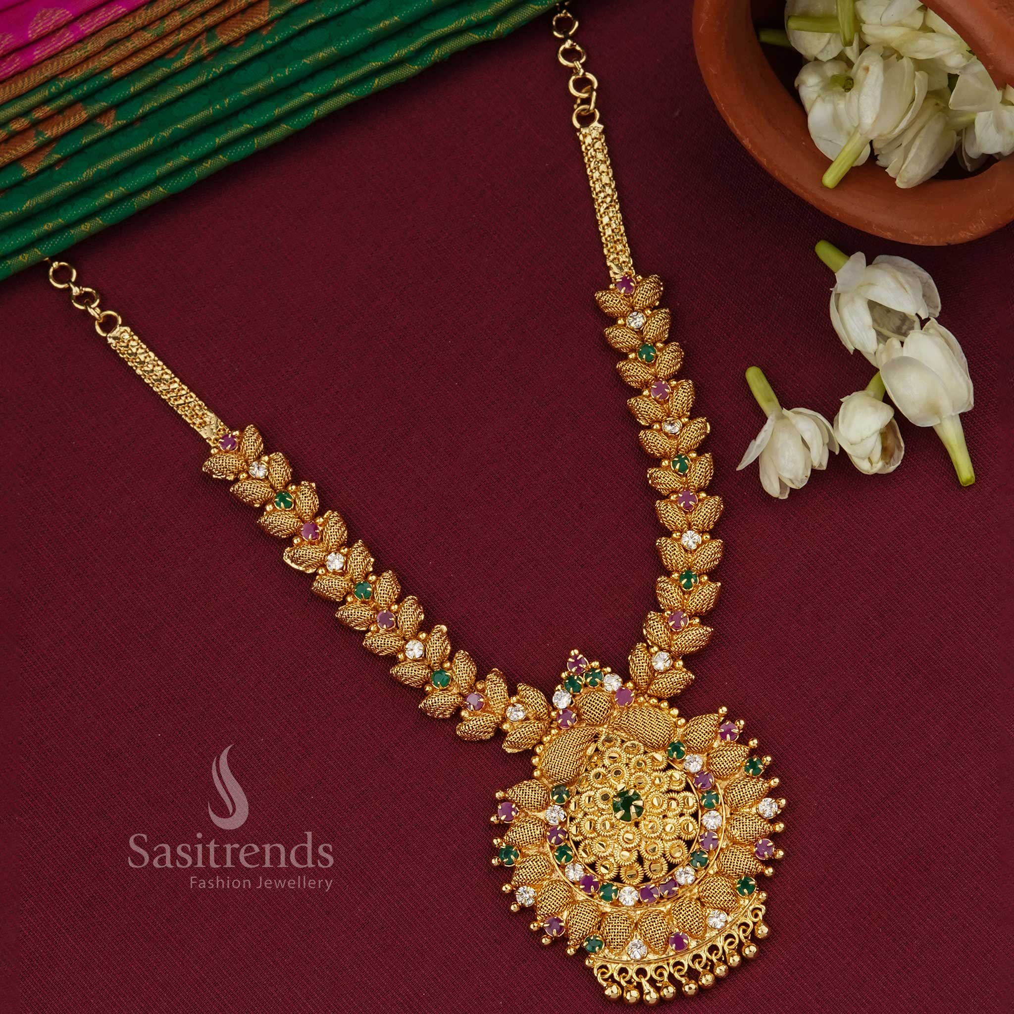 Vibrant multi-tone leaf net design micro gold plated necklace embellished with premium American Diamond stones, crafted for a classic ethnic look – Jewellery from Sasitrends