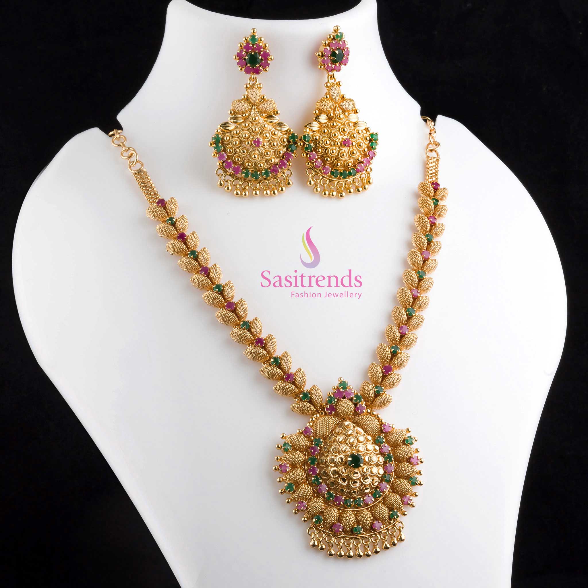 Elegant ruby-green leaf net design micro gold plated necklace and earrings combo with sparkling American Diamond stones, ideal for pairing with traditional outfits – Jewellery by Sasitrends