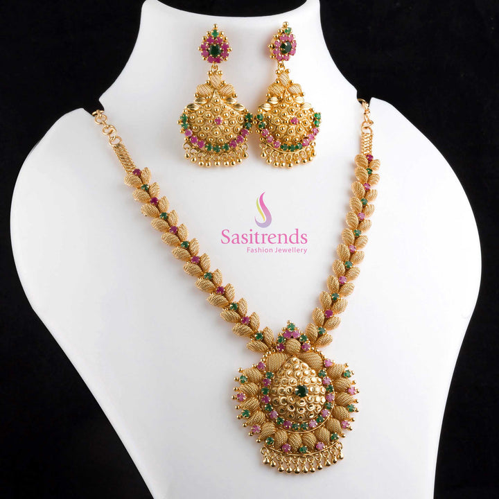 Elegant ruby-green leaf net design micro gold plated necklace and earrings combo with sparkling American Diamond stones, ideal for pairing with traditional outfits – Jewellery by Sasitrends