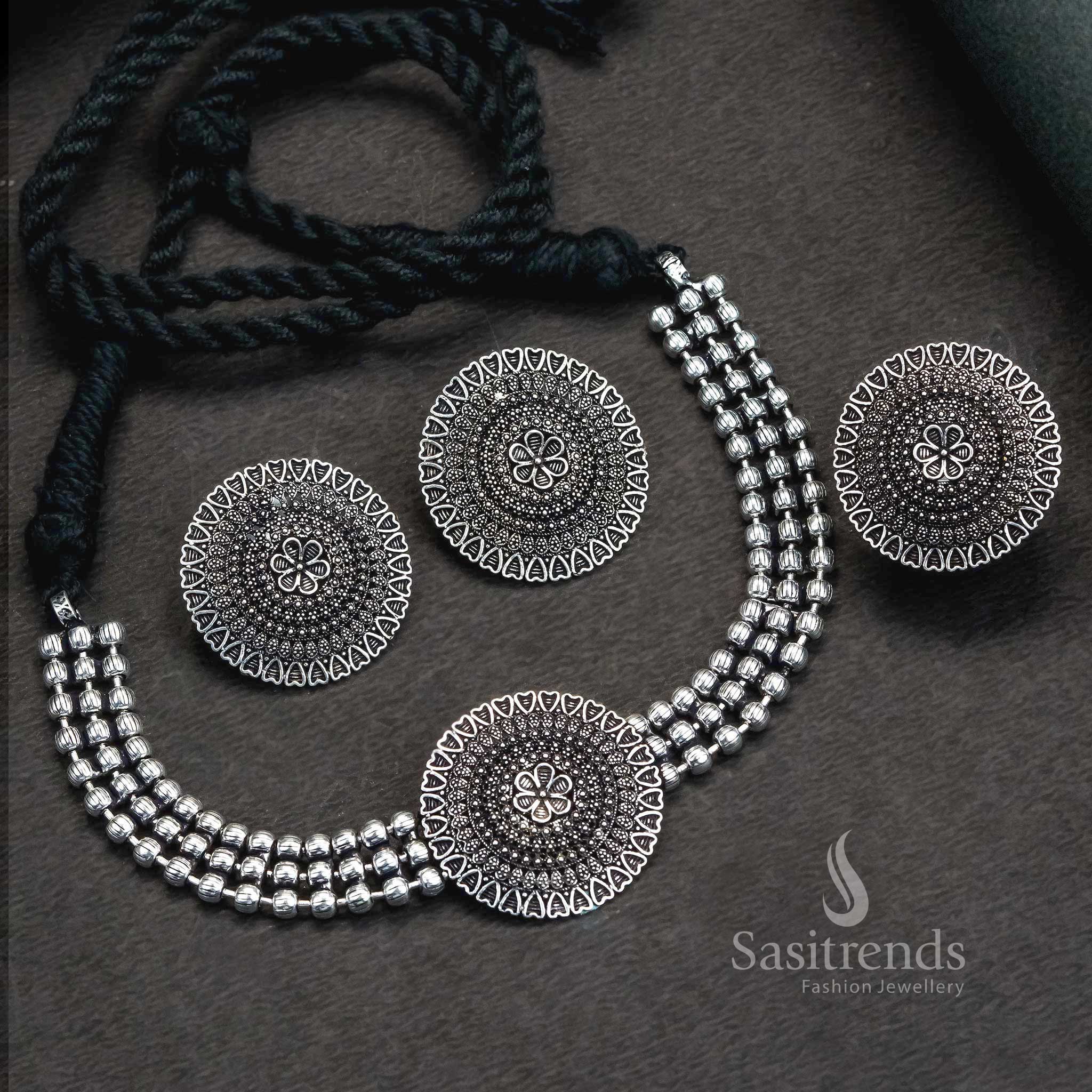 Elegant fusion-style oxidised Kanta choker combo jewellery set for girls and women, featuring artistic floral motifs and graceful jhumkas – Sasitrends