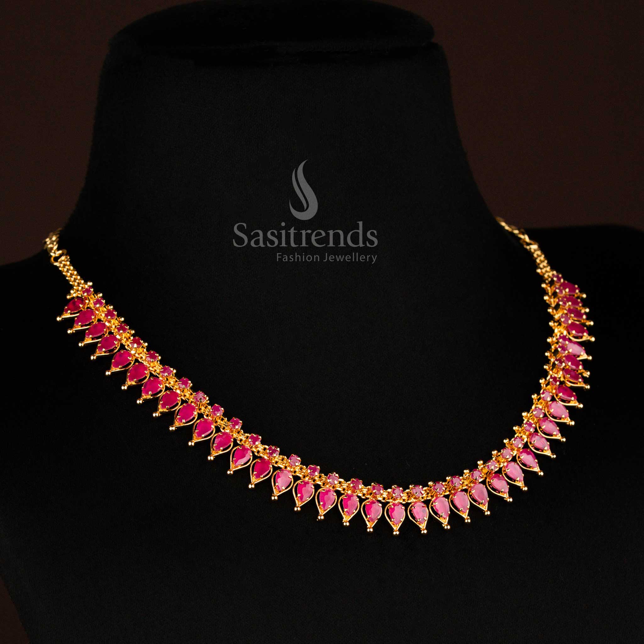 Temple-inspired micro gold ruby necklace with tilak motifs, AD embellishments, and vintage South Indian jewellery charm – Sasitrends