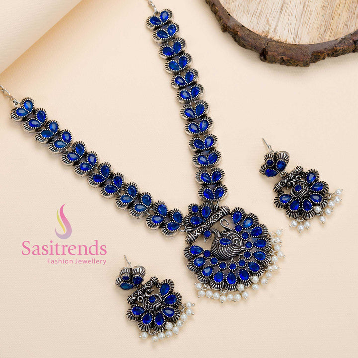 Oxidised antique-finish blue stone peacock necklace set with pearl earrings, a traditional party jewellery piece with a subtle modern twist – Sasitrends