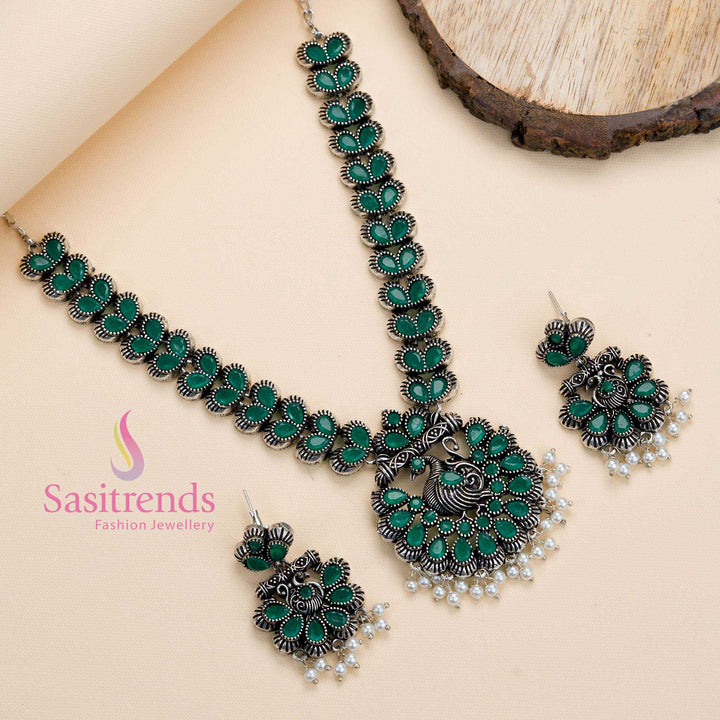 Ethnic oxidised green stone studded peacock pendant jewellery set with pearl hangings, flaunting a regal antique finish perfect for partywear – Sasitrends