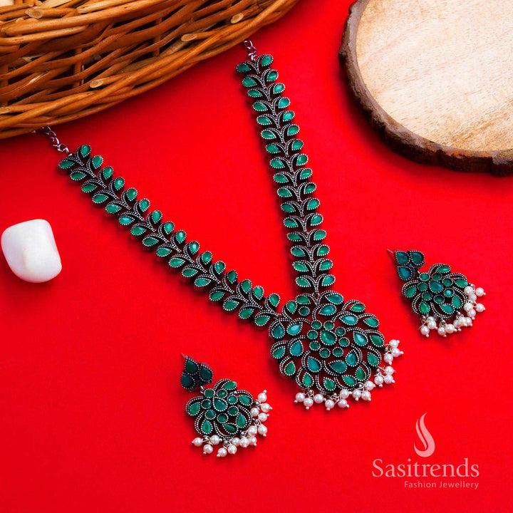 Oxidised silver Green floral stone necklace and earring jewellery set, showcasing rustic finish and antique charm, perfect for traditional functions and festive occasions – Sasitrends