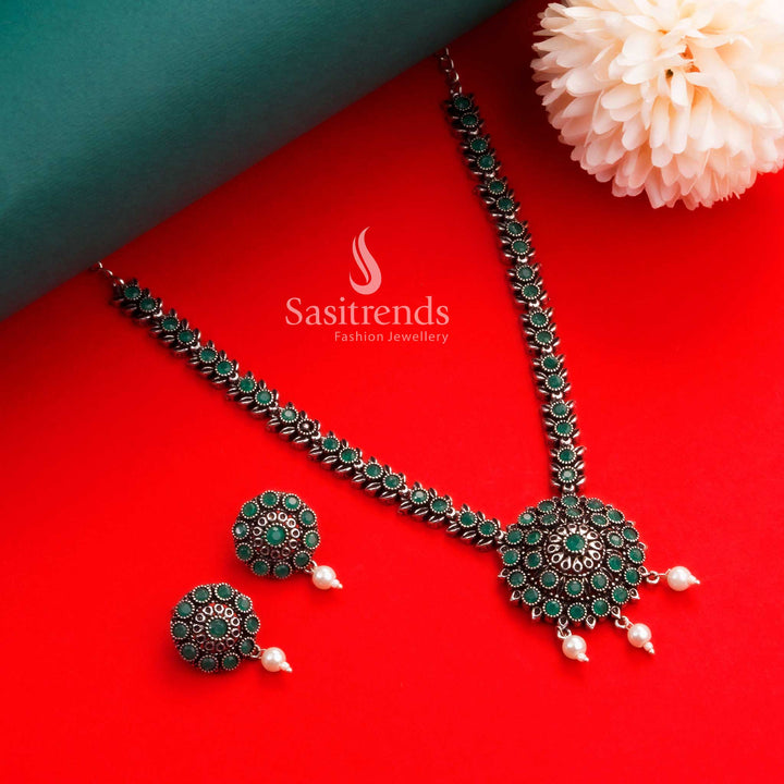 Graceful green stone oxidised silver necklace jewellery set with floral design and pearl accents, a traditional yet stylish pick for Navarathiri charm – Sasitrends