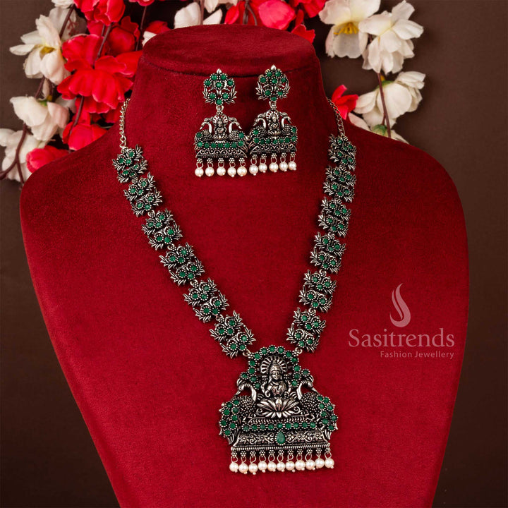 Temple-inspired green Lakshmi and peacock oxidised jewellery set with pearl hangings, a must-have for traditional festival attire and spiritual elegance – Sasitrends