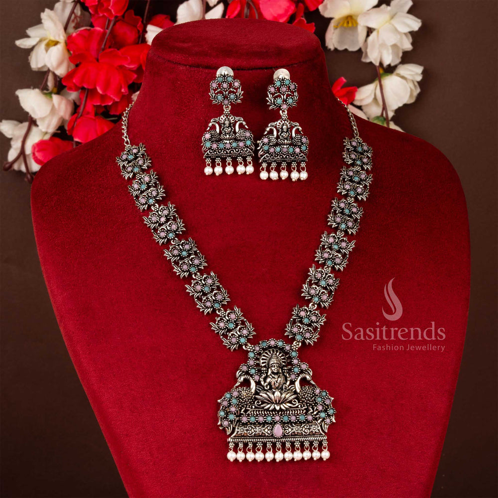 Dual-tone grace pink and mint floral peacock Lakshmi necklace set in oxidised silver with divine pearl trim, a captivating choice for festive glamour – Sasitrends