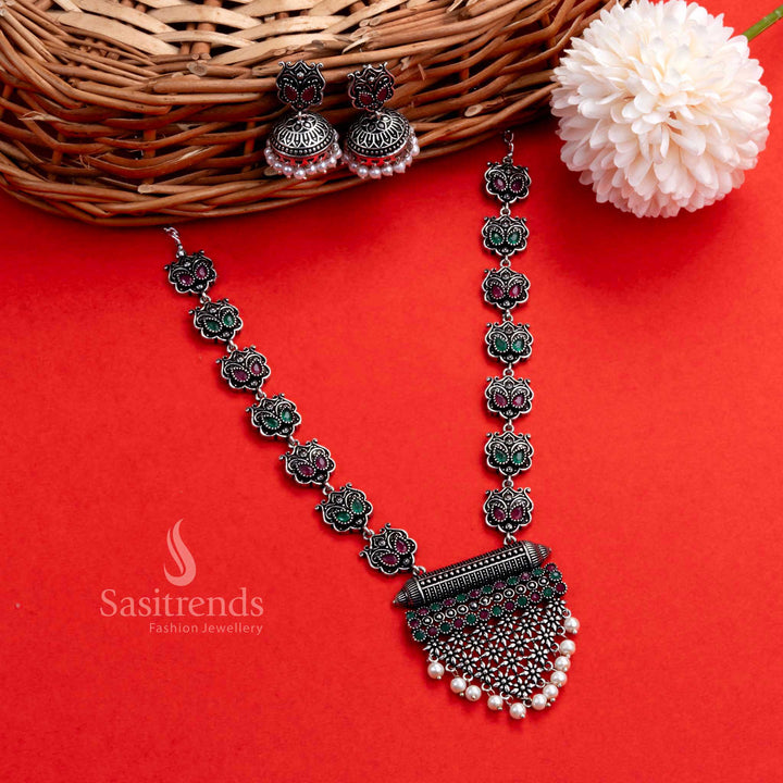 Elegant ruby-green party wear oxidised silver jewellery set with grape cluster pendant and traditional jhumkas, a vibrant festive pick for celebrations – Sasitrends