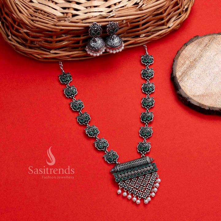 Vibrant green stone oxidised jewellery set with jhumkas and floral grape pendant, perfect for achieving a traditional party look with grace – Sasitrends