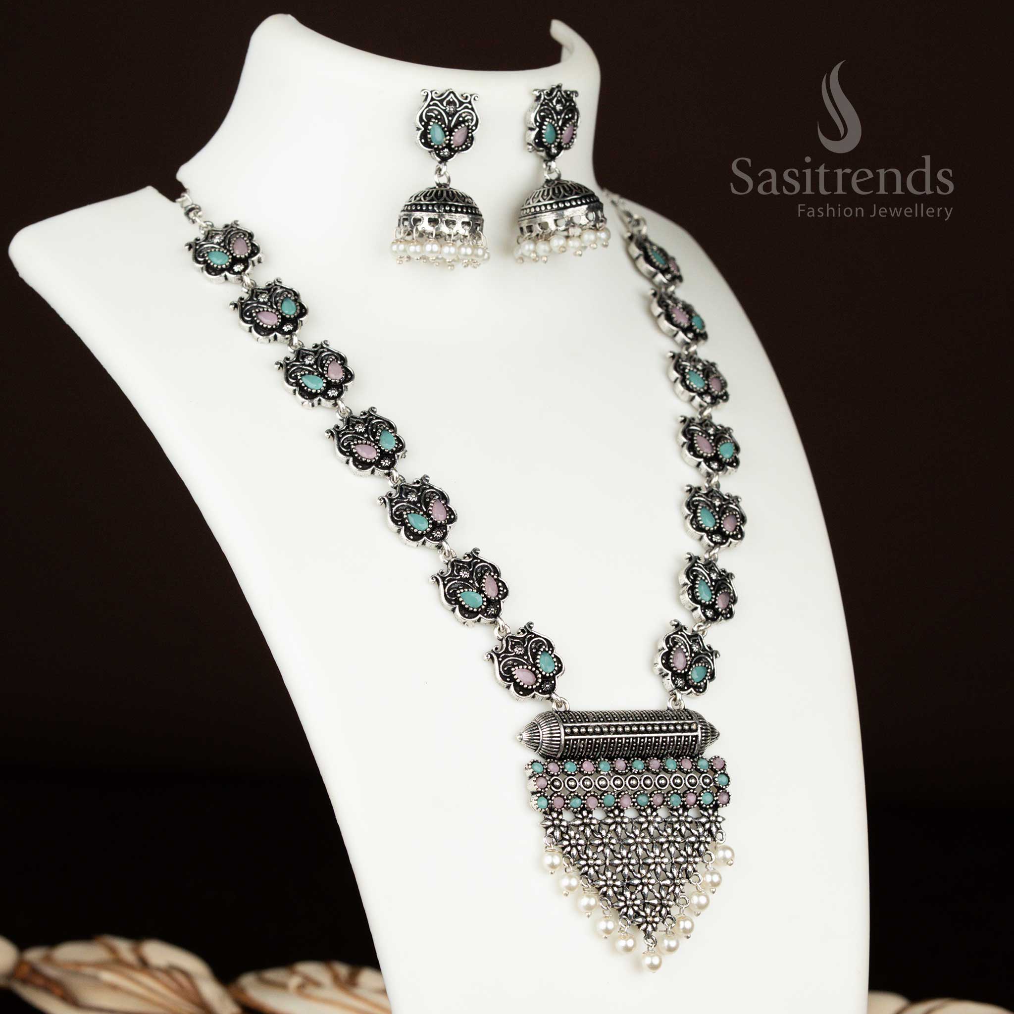 Dual-shade pink-mint stone necklace in oxidised silver with matching jhumkas – an elegant party jewellery set that brings vintage charm and pastel perfection from sasitrends