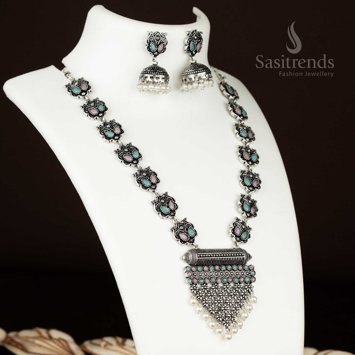 Dual-shade pink-mint stone necklace in oxidised silver with matching jhumkas – an elegant party jewellery set that brings vintage charm and pastel perfection from sasitrends