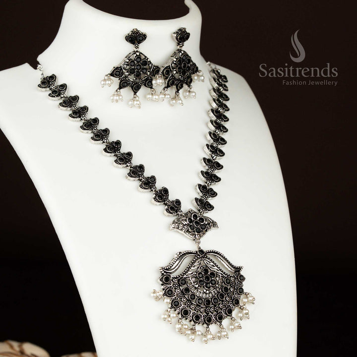 Black oxidised floral party necklace with pearl hanging earrings – bold elegance meets ethnic charm in a striking jewellery set by sasitrends