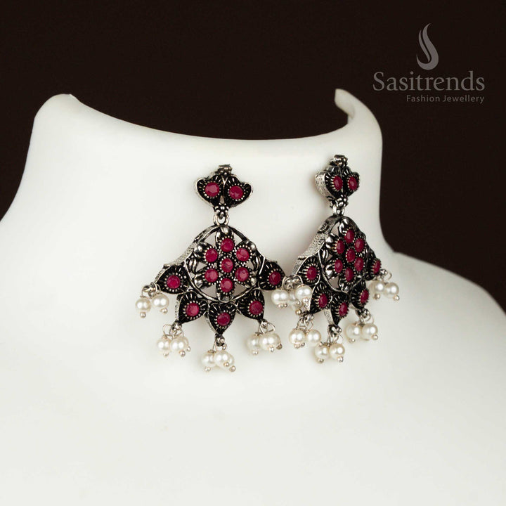 oxidised Earrings with floral pendant and pearl hangings – a glamorous and bold party jewellery set with traditional richness from sasitrends