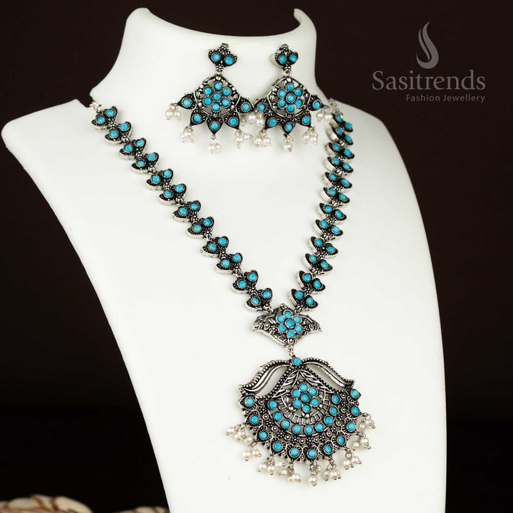 Sky blue floral pendant necklace in oxidised silver with pearl drop earrings – a dreamy party jewellery set that’s cool, breezy, and elegant from sasitrends