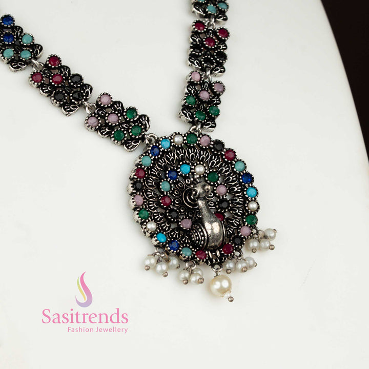 oxidised peacock necklace crafted in German silver with pearl drops – a chic fusion jewellery set combining tradition and soft elegance from sasitrends