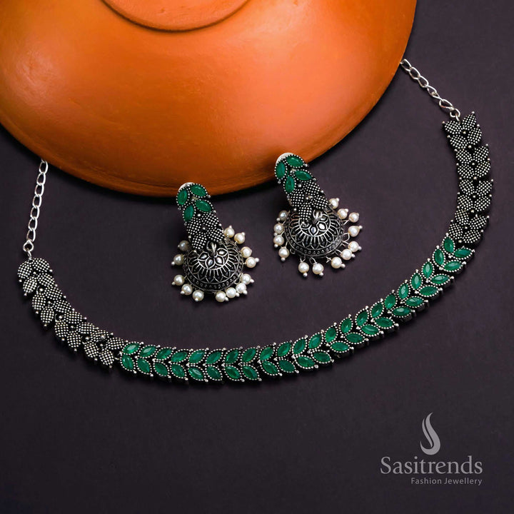 Vibrant Green Oxidised Stone Choker With Leaf Motif And Festive Pearl Jhumkas Jewellery - Sasitrends