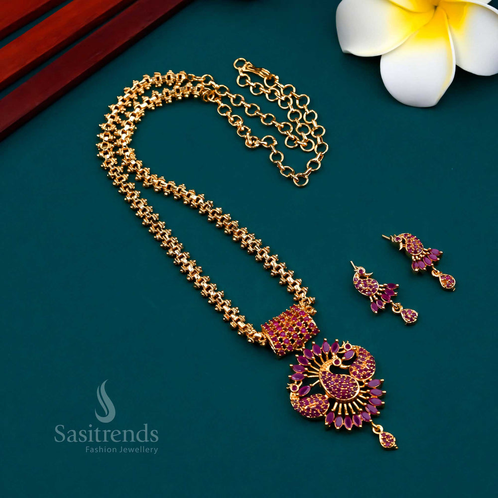 Elegant ruby tone long peacock pendant Gajiri jewellery set in micro gold plating with American diamond sparkle, perfect for traditional celebrations and bridal occasions – Sasitrends