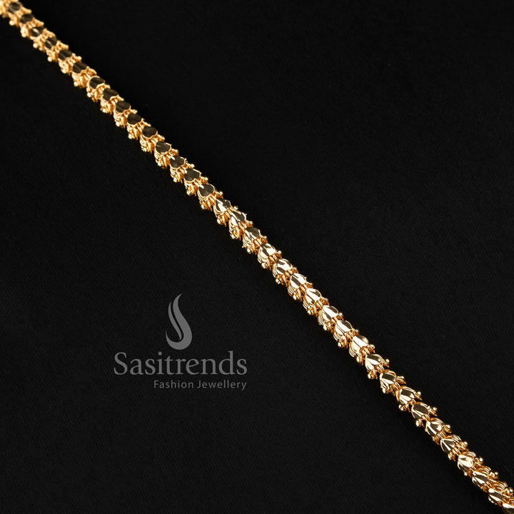 Elegant traditional-style capsule link long chain with a stone-studded floral mango motif centerpiece.