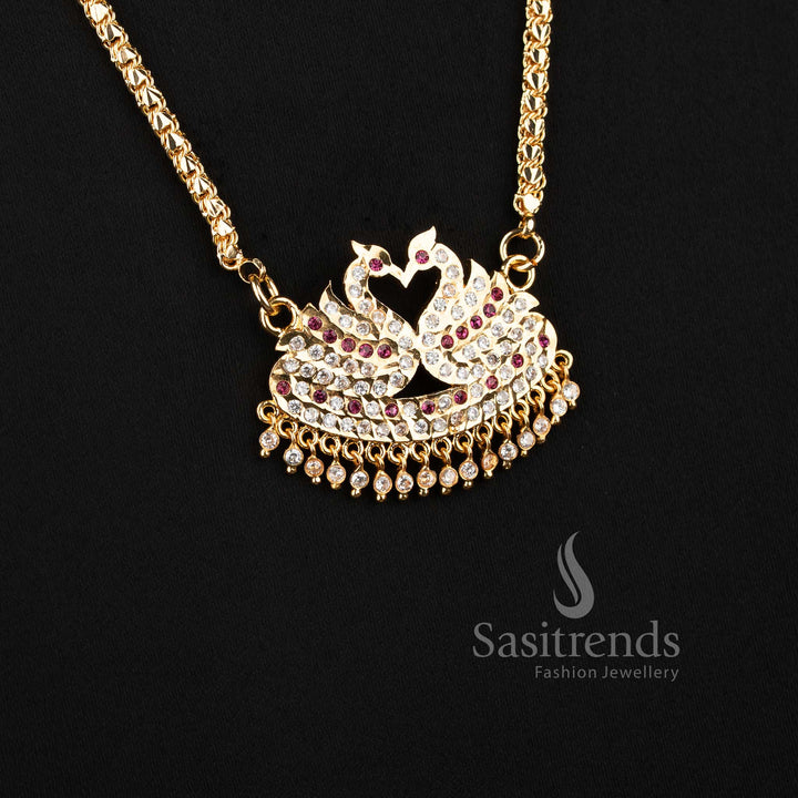 Close-up of an elegant traditional wear interlocking lotus bud chain layout with a stone-studded semicircular swan motif pendant.