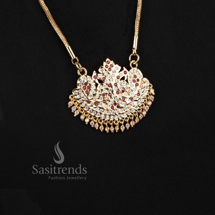 Close-up of an elegant traditional wear interlocking mesh chain layout with a stone-studded bird motif semicircular pendant.
