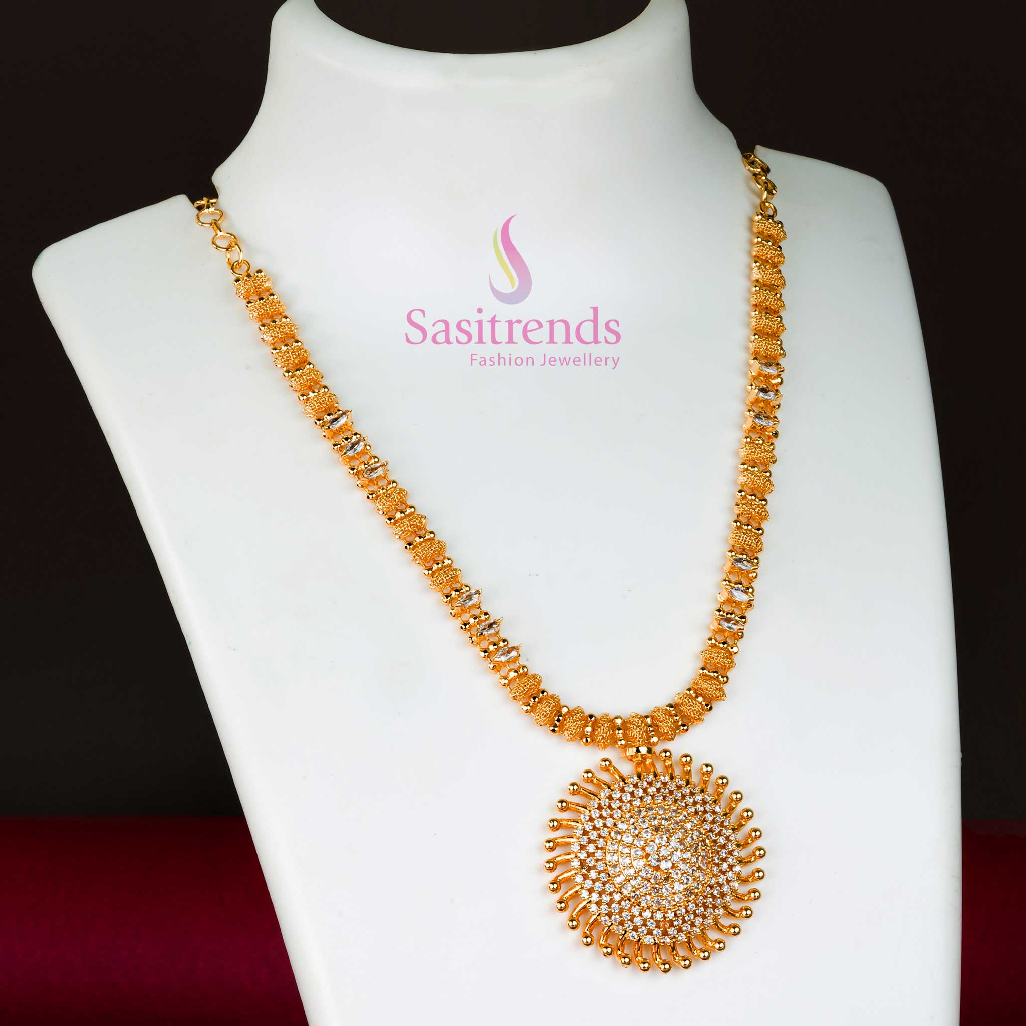 Radiant white stone micro gold plated necklace featuring a sunburst locket with delicate floral AD detailing – a classic bridal jewellery piece for elegant ensembles – Sasitrends