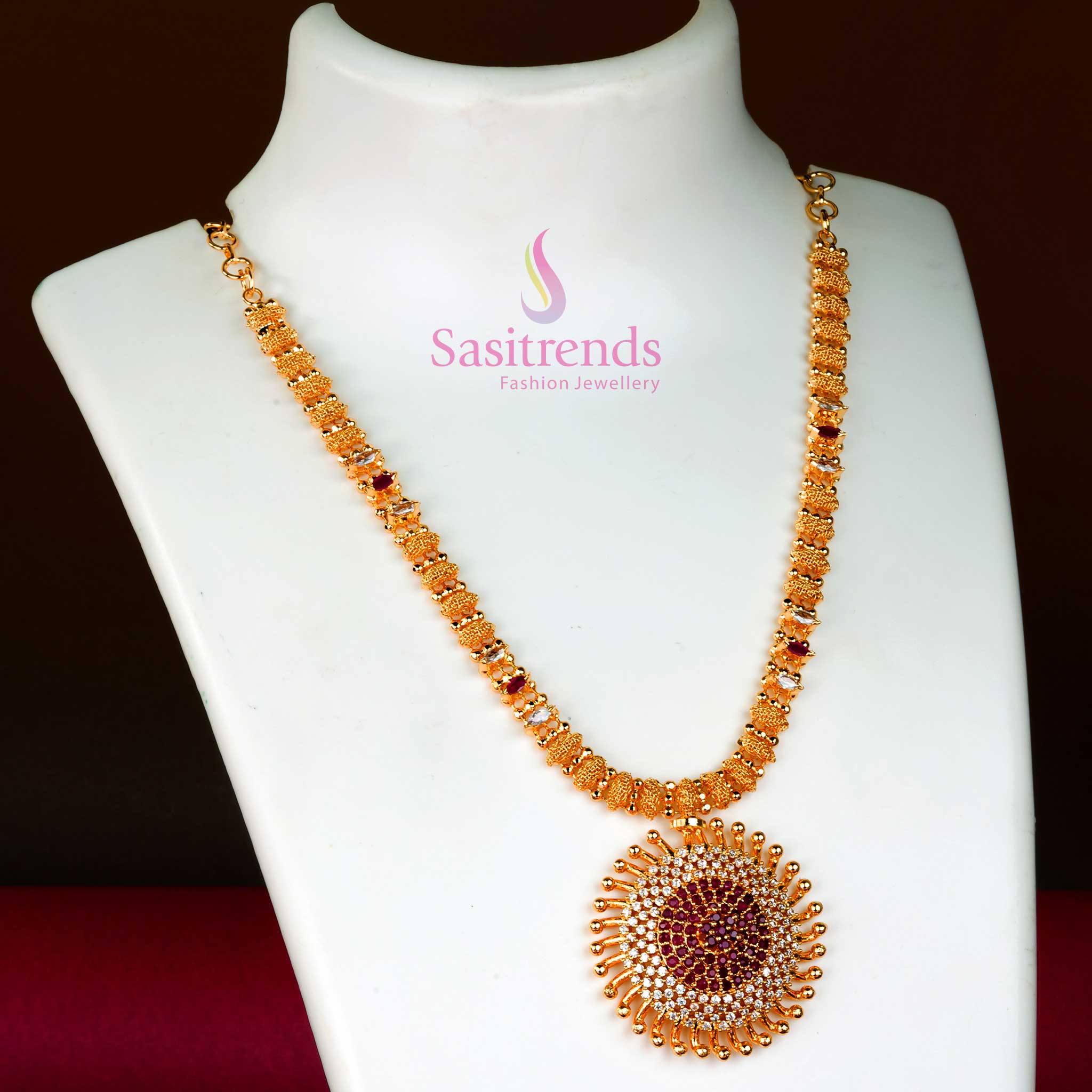 Elegant white-ruby micro gold plated necklace with a captivating sun motif locket and adorned floral AD design – a stunning jewellery creation for special moments – Sasitrends
