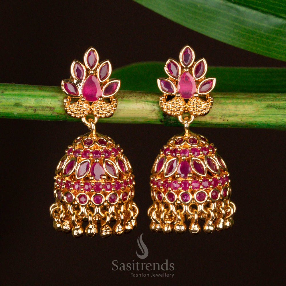 Magnificent and majestic ruby-hued traditional jhumka earrings, micro gold plated and adorned with dazzling AD stones - Sasitrends