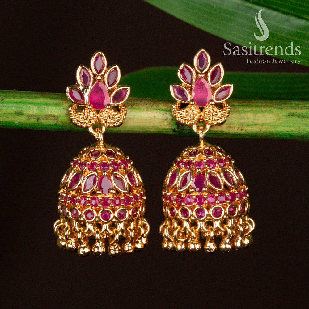 Exquisite white-ruby traditional jhumka earrings with micro gold plating, accented by shimmering American Diamond stones and elegant pearl drops – A radiant ethnic jewellery piece for festive grace – Sasitrends

