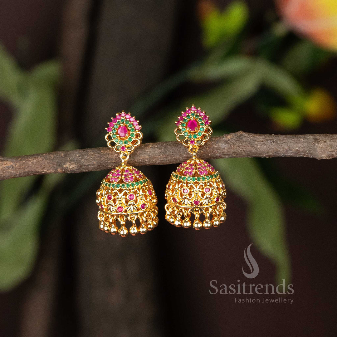 Radiant ruby-green traditional jhumka earrings in micro gold finish adorned with kemp stone motifs and lustrous pearl details – perfect for cultural festival dressing – Sasitrends