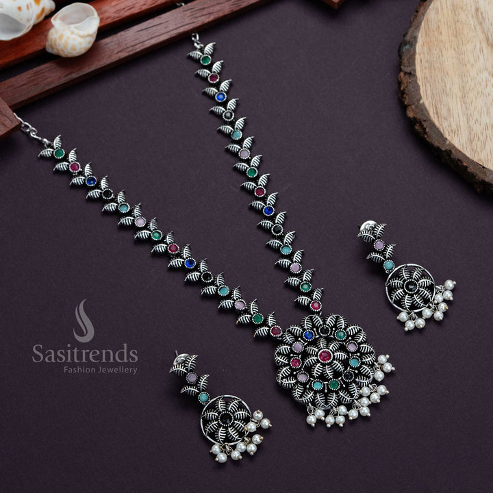 Vibrant multi-colour oxidised silver necklace with flower-leaf design, pearl stones and matching earrings – colourful ethnic jewellery set for saree styling – Sasitrends