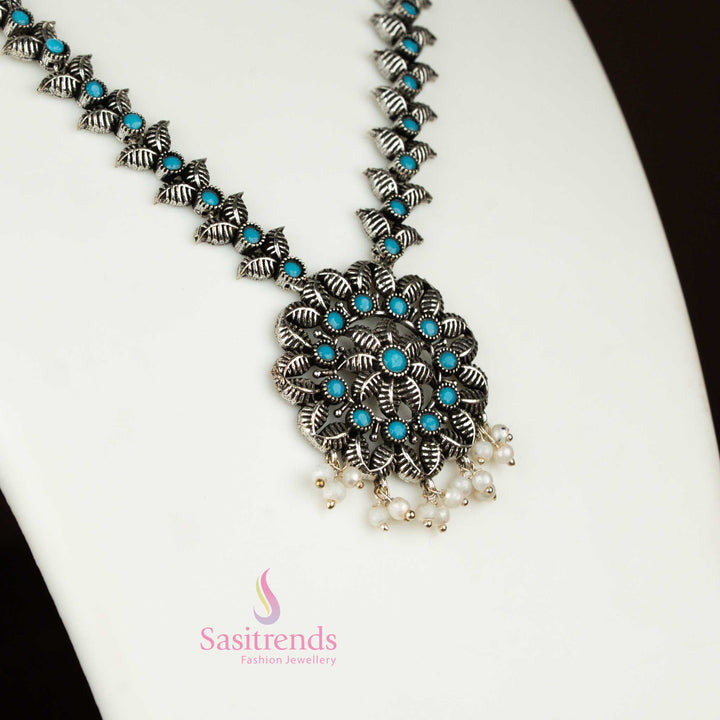 Trendy oxidised silver sky-blue necklace with pearl stone flower-leaf pendant and matching pearl earrings, an artisan tribal-inspired jewellery set – Sasitrends