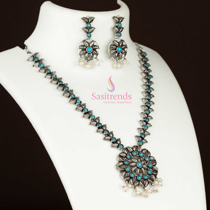 Boho-style sky-blue oxidised silver necklace and earrings set with pearl drops, delicate leaf motif and floral design for a traditional fusion jewellery look – Sasitrends