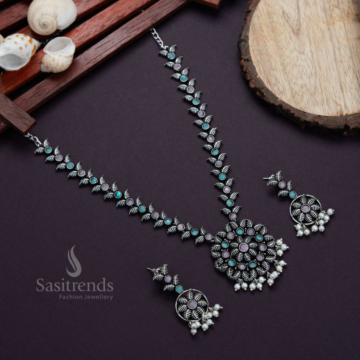 Soft pink-mint oxidised necklace with detailed leaf pendant, pearl drops and matching earrings – a fusion festive jewellery choice – Sasitrends