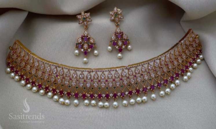 Bridal temple choker jewellery set in a radiant matte gold tone, adorned with AD stone-studded floral motifs, crafted for festive elegance and traditional bridal finesse – sasitrends