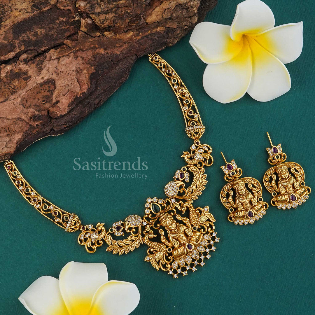 Majestic bridal jewellery set adorned with Lakshmi motif, shimmering AD stones, and pearl detailing in elegant temple matte gold – Sasitrends