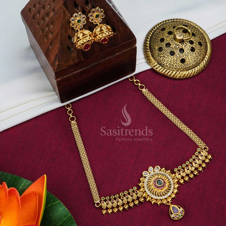 Royal temple matte gold finished choker jewellery set with majestic floral-peacock design, shimmering American Diamond stones and traditional jhumkas – ideal for grand bridal occasions – Sasitrends